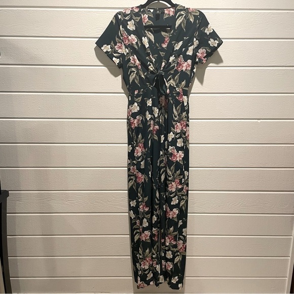 NWOT Volcom Emerald Green Haute Tropic Floral
Plunge Jumpsuit Size Small - Picture 4 of 12